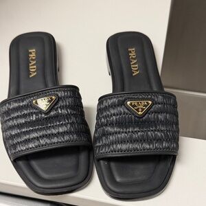 Prada Black Quilted Slide Sandals with Gold Triangle Logos